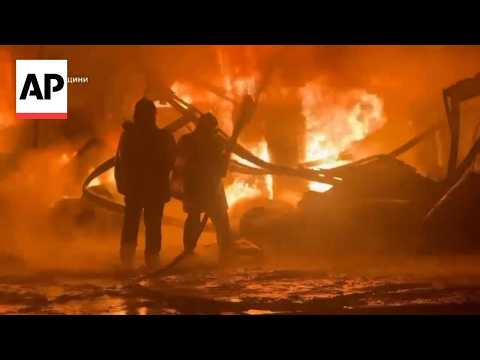 Firefighters work through the night to extinguish blaze at Bucha warehouses after Russian attack