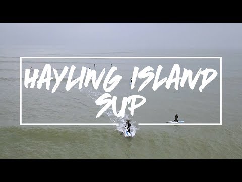 Imágenes de drones de surfistas de remo en Hayling Island