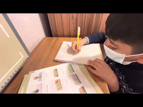 Raiyan selecting his birthday cake.