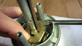 How to remove the lock cylinder from a Kwikset SmartKey entry knob