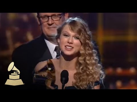 Taylor Swift accepting the GRAMMY for Album of the Year at the 52nd GRAMMY Awards | GRAMMYs