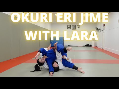 Okuri eri jime roll — judo technique demonstration