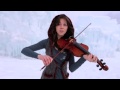 Девушка во льдах очень красиво играет на скрипке под дабстеп 