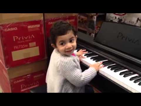 Mariam playing piano