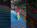 Running Up The Stairs At Batu Caves In Malaysia