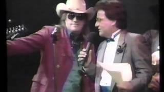 Texas Tornados Freddy Fender and Doug Sahm talking with Johnny