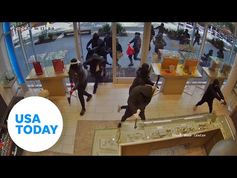 Watch masked thieves storm jewelry store in smash-and-grab robbery