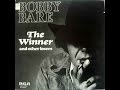 "The Winner" by Bobby Bare from his album Lullabys, Legends, and Lies from 1973.
