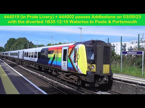 SWR 444019 (in Pride Livery) + 444002 passes Addlestone on 03/09/23 with a diverted train to Poole