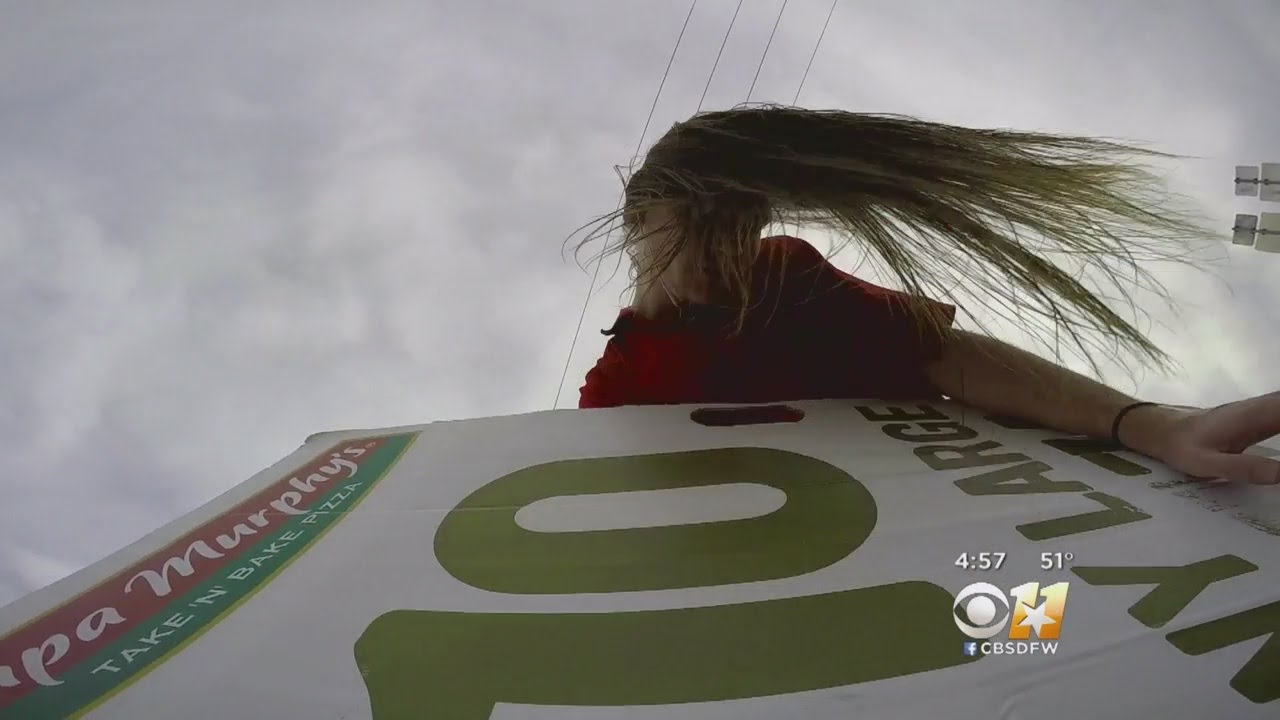 Sign Spinner Rocks Arlington! - YouTube