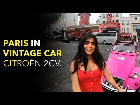 Paris in Vintage car Citroën 2CV.