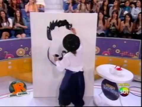 Marquito pinta quadro de Ratinho ao vivo