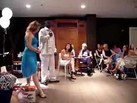 Groom-to-be sings to guests of bridal shower