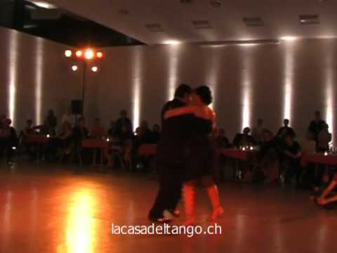  Corina de la Rosa  and  Julio Balmaceda  are  dancing  to  a  vals