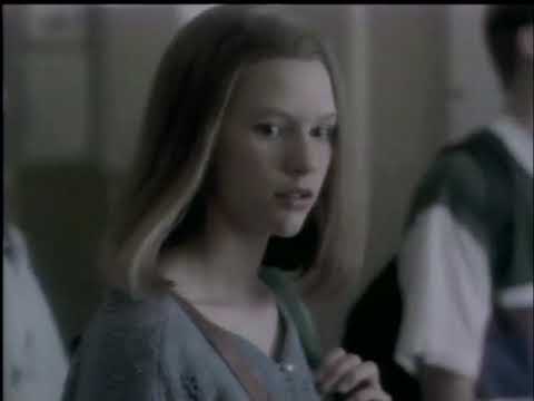 Closing montage style frame of Angela Chase looking out of a window as the theme music swells