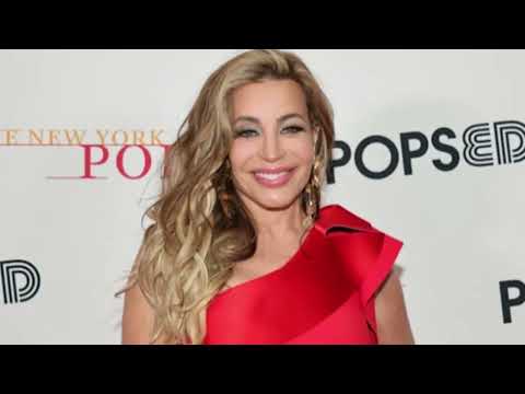 80's music icon, 63, glows in make up free bikini shot