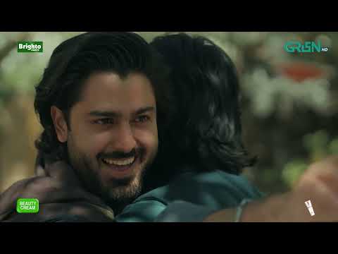 Bashah and his rival share a tense, unspoken moment across a formal mahogany table, their postures rigid and eyes locked.