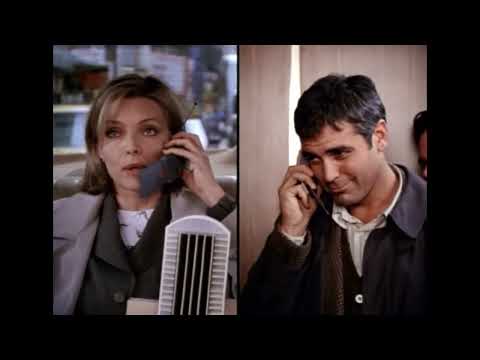 One Fine Day trailer still — two frazzled New York single parents hustle across Midtown with kids and coffee