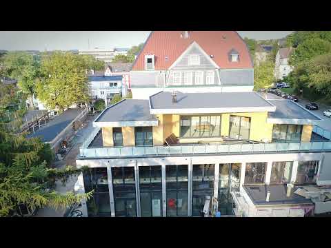 Dachaufstockung auf eine ehemalige Turnhalle