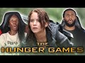 OUR FIRST TIME WATCHING THE HUNGER GAMES | MOVIE REACTION