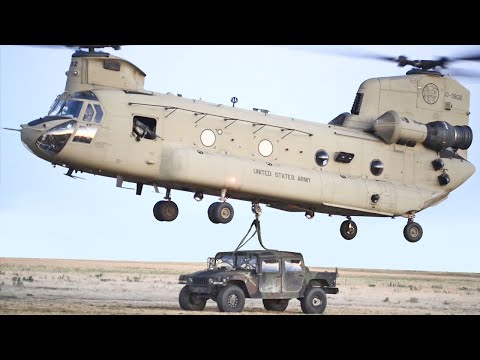 Boeing CH-47 Chinook Helicopter Lifting Military Vehicle, United States Army