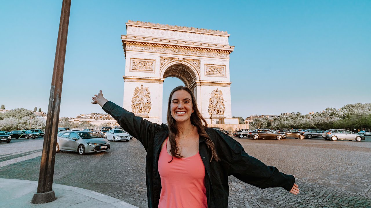 Experience the allure of the Arc de Triomphe with travelers in this video.