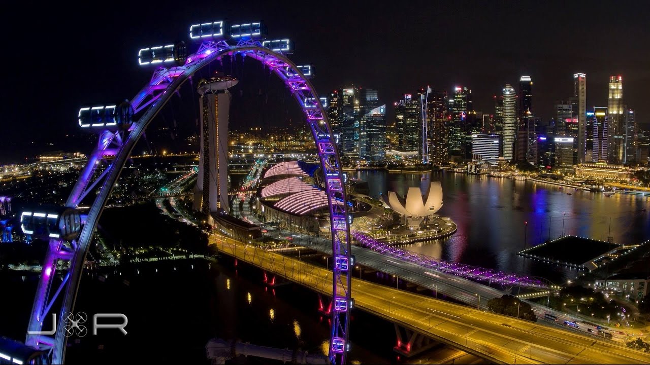 Witness the Singapore Flyer's splendor from the sky!