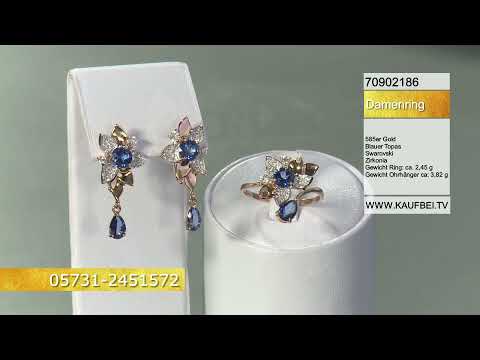 Золотое кольцо 585 пробы с топазами Swarovski и фианитами Swarovski