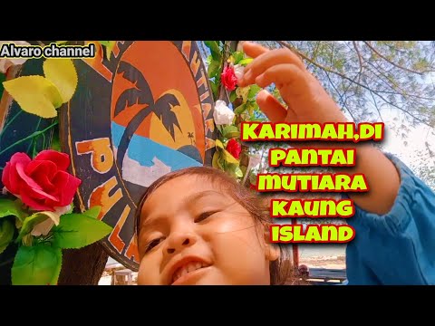 Karimah, berwisata di pantai mutiara kaung island.