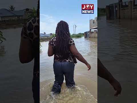 Wading through the flooded streets of Sampah Valley