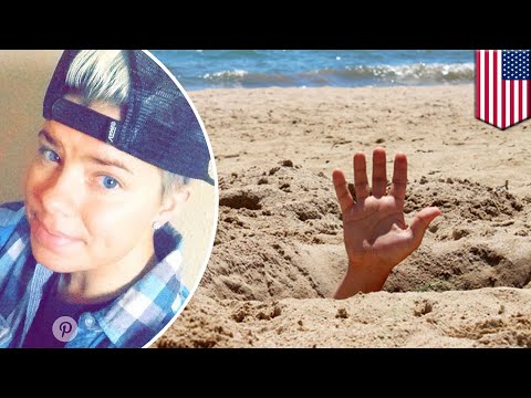 Wanita terkubur hidup-hidup ketika jatuh ke lubang pasir galian di pantai - TomoNews