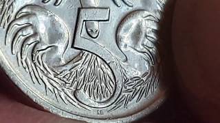 Searching 5 cent coins for errors