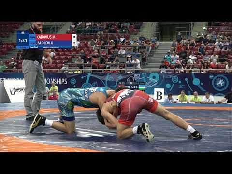 1/2 FS - 55 kg: M. KARAVUS (TUR) v. U. JALOLOV (UZB)