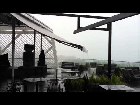 Francia® Jumbo Retractable Awning in Heavy Rain