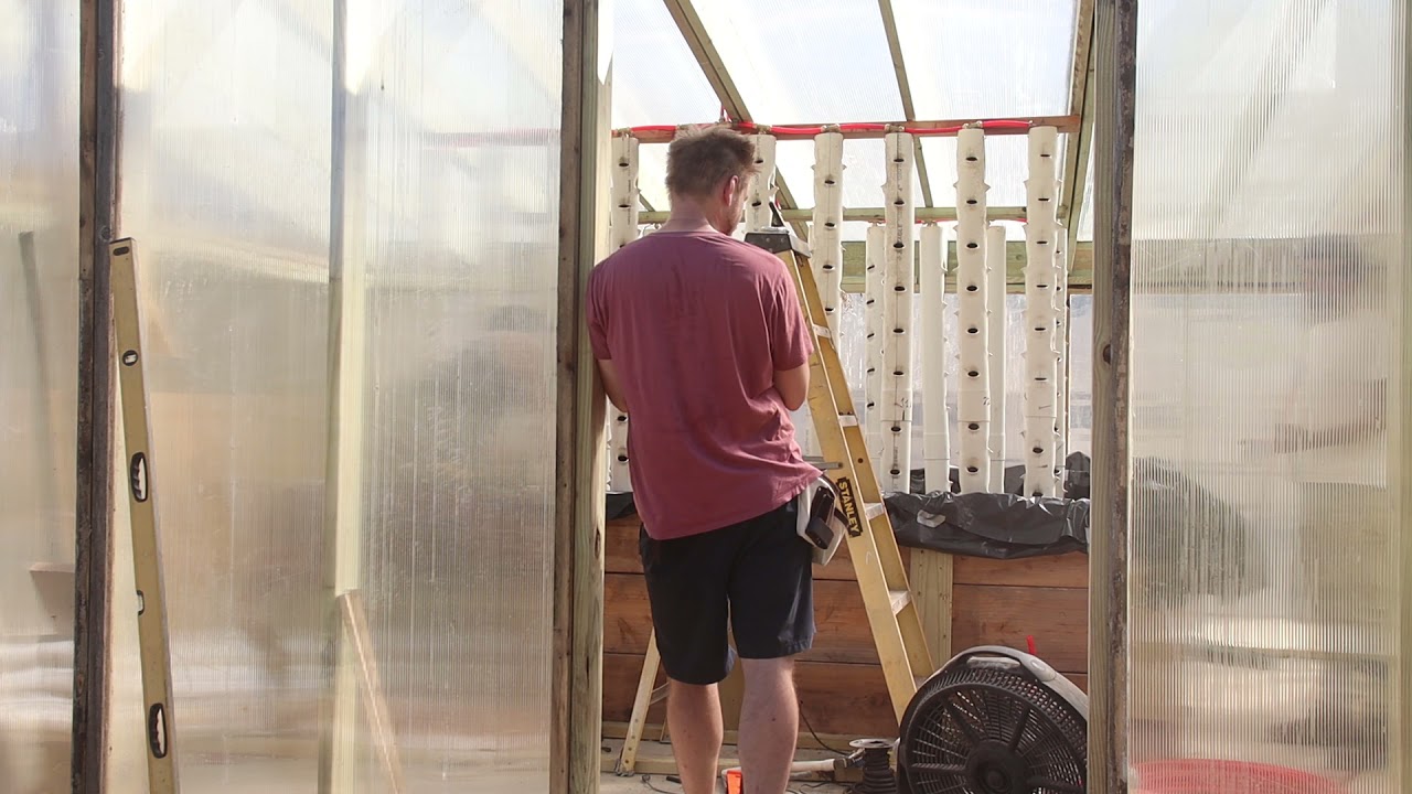 Finishing Aquaponic Greenhouse Watering System