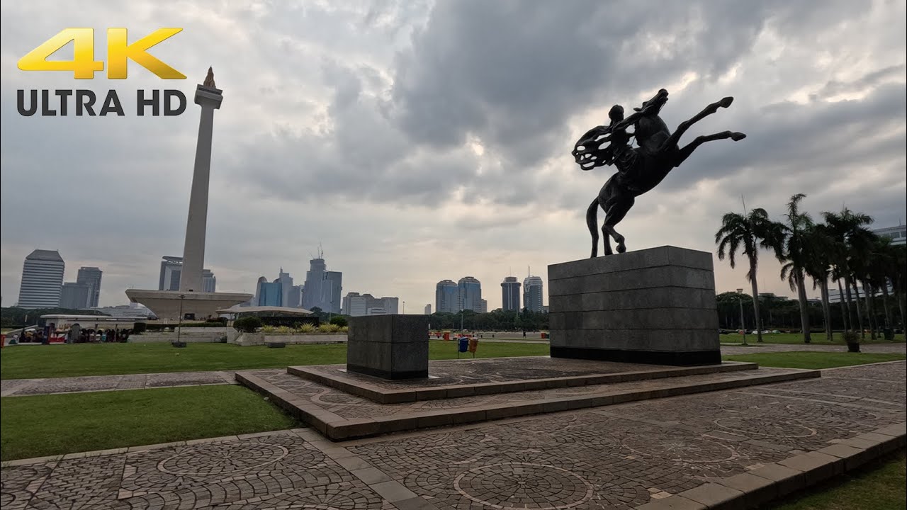Immersive street-level walking tour through Jakarta Monas, Indonesia, showcasing authentic urban landscapes, local architecture, and the vibrant atmosphere of the city's neighborhoods