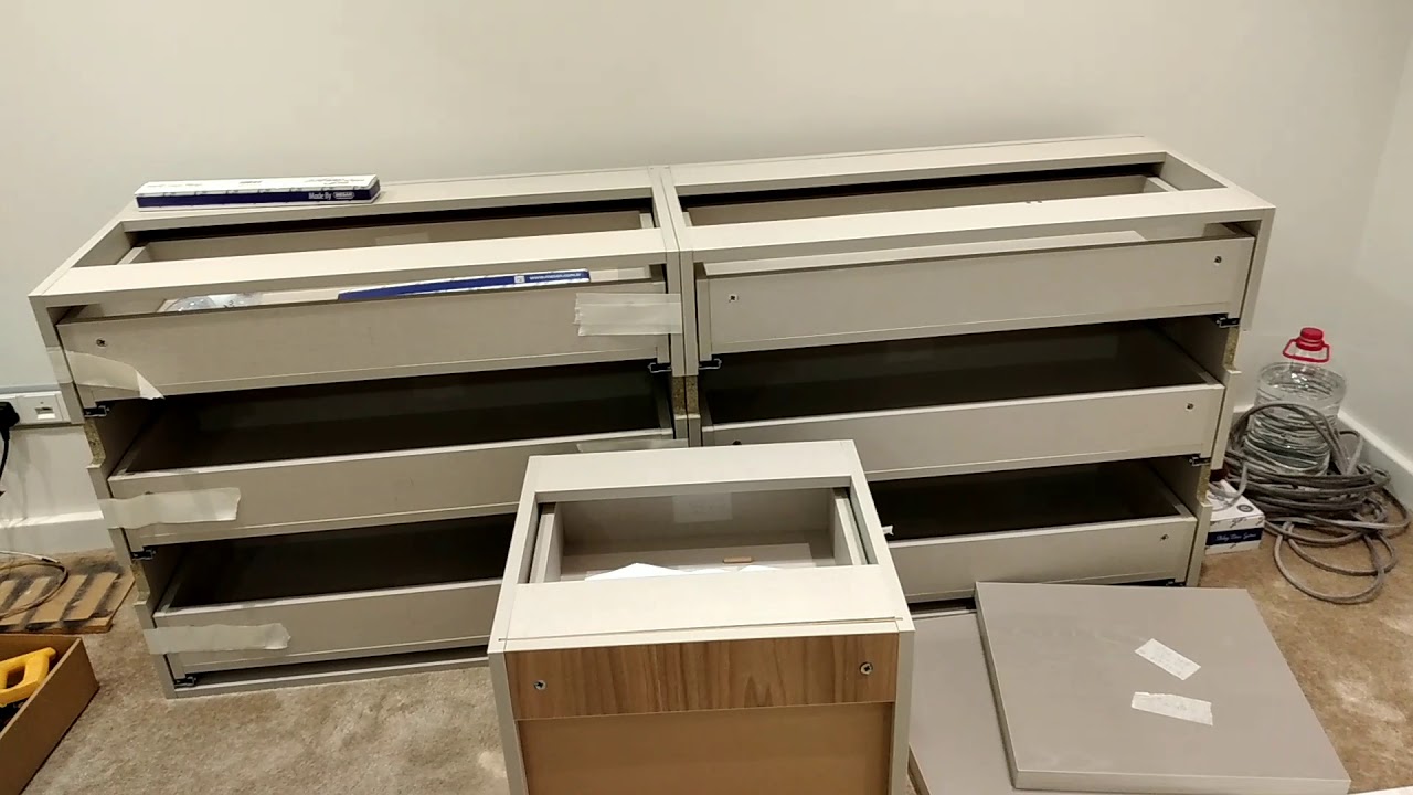 Closet cabinet with sliding doors and cabinet with 6 drawers