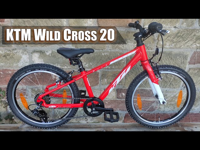 Видео о Велосипед KTM Wild Cross 20" Metallic Fire Orange (White)