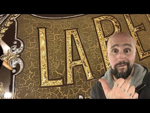 Real gold crack effect. Gold leaf glass sign