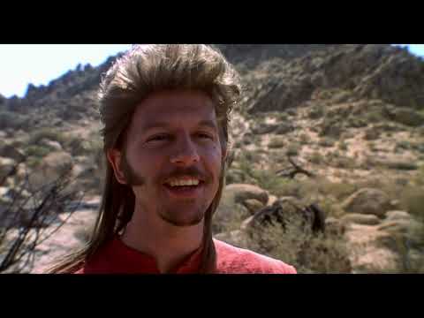 Quick-cut trailer grid of cars, carnivals, and desert highways—visuals that match the soundtrack’s road-ready guitars
