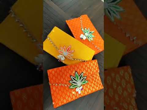 Multicolor banarsi envelope with buti and latkan, banarasi s...
