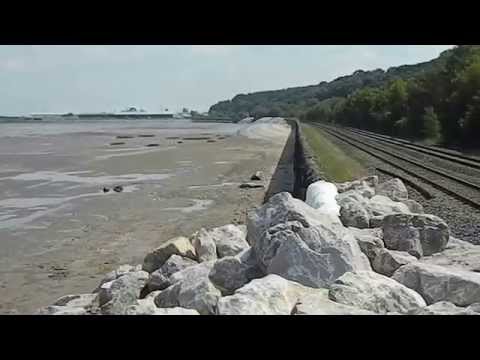 Panorama from breached sea and BR railway wall at Ffynnongroyw Flintshire Wales UK
