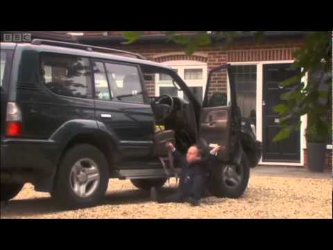 Dwarf falls out of a car