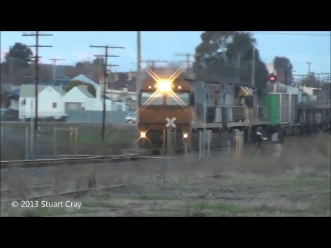 NR66, NR52 & 9310 - Kids on crossing, Driver on horn - Pacific National Steel Train 16th June 2013