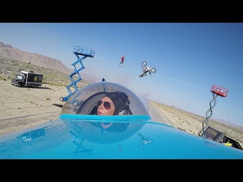 Flying Under a Highliner and a Bike BackFlipping