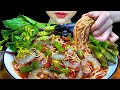 EATING SPICY THAI FOOD SPICY RICE NOODLES WITH SHRIMP SALAD