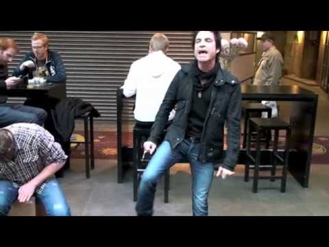 Train performs Drops of Jupiter live unannounced in a mall in Stockholm