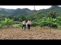 Restoring an abandoned mountain garden plot to grow food during the harsh rainy season.