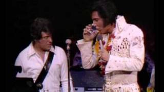 Elvis Presley intruduce his band in Aloha From Hawaii 1973
