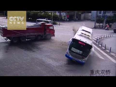 Bus loses control, rolls over after truck collision